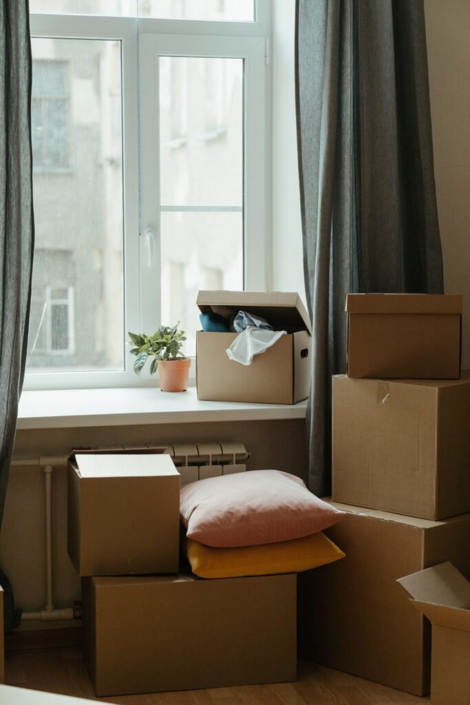 Empty room with moving boxes ready for an end of lease clean